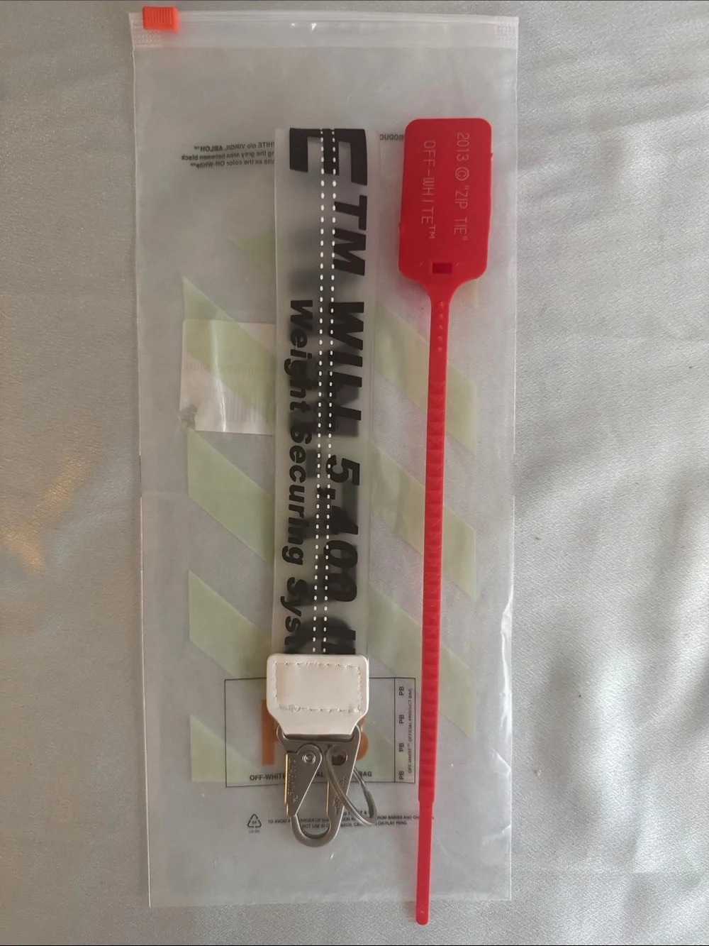 New! Off-White White Nylon Key Strap with Black Diagonal Text and Red Zip Tie